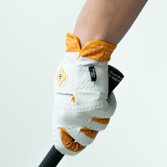 Alpine Golf Raiu Edition - Electric yellow and white thunder-inspired golf glove with moisture-wicking cuff, featuring a custom lightning aesthetic on premium leather.